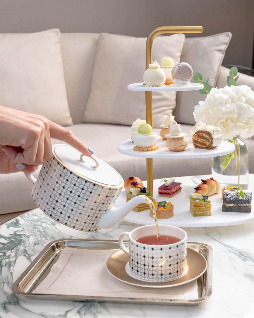 Escape the chill of winter and enjoy a cozy afternoon tea with views of the majestic Burj Khalifa at
